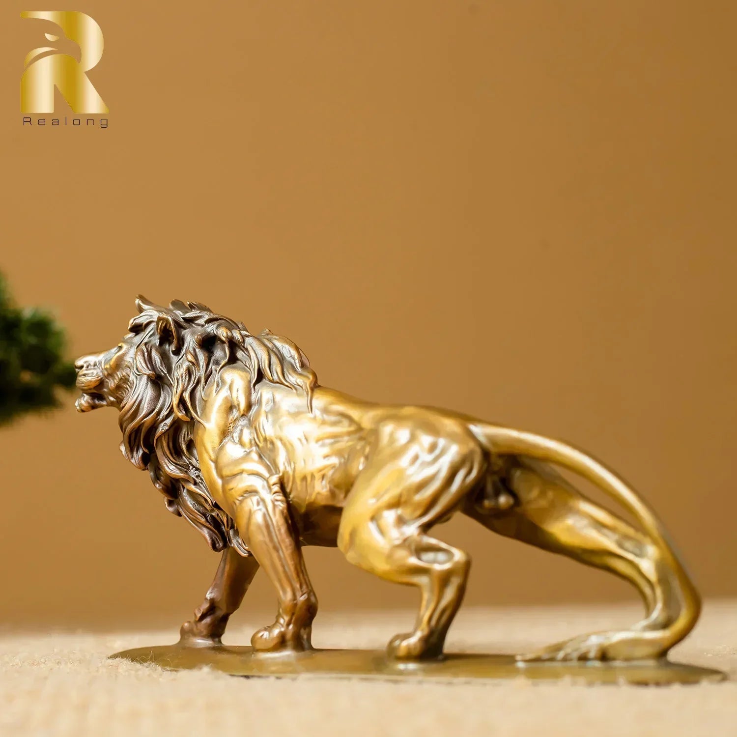 Exquisite bronze lion statue with detailed mane and muscular physique for luxury home and office decor