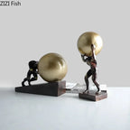 Bronze-colored fitness metal figure statues with modern style muscular figures holding golden spheres for home decor