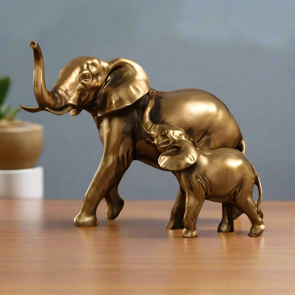 Golden elephant family figurine, 24K gold finish, intricate resin design - House of Avana