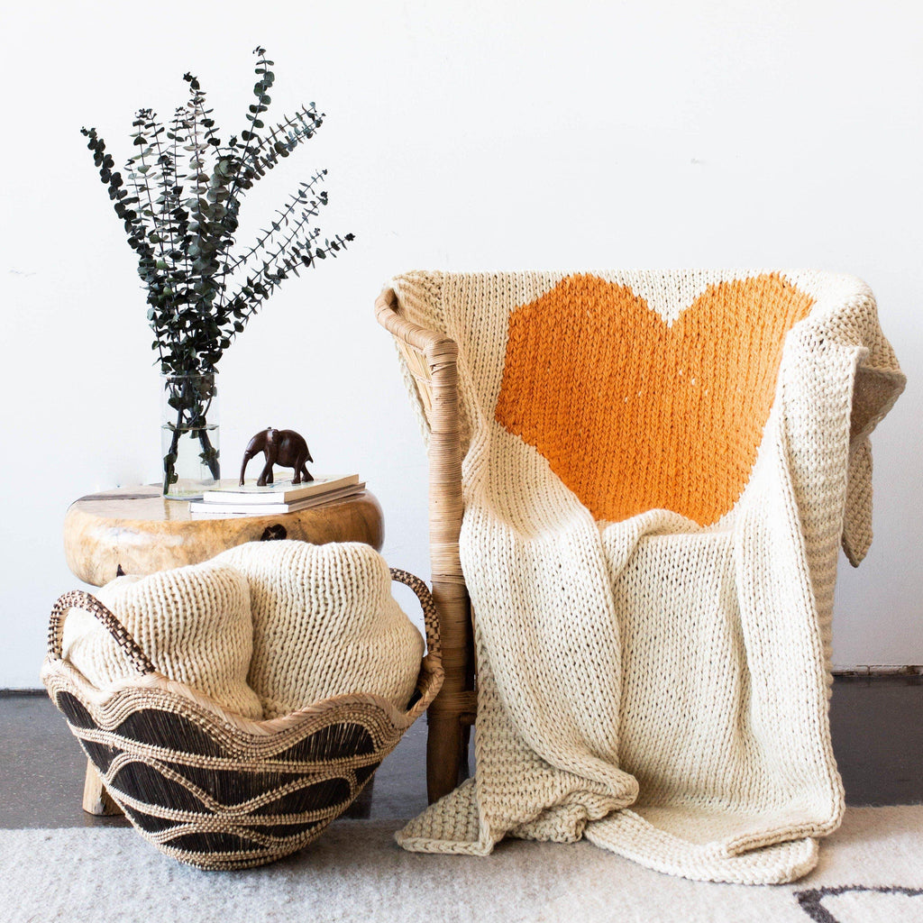 Hand-knitted Merino Wool Heart Throw Blanket, angled view - House Of Avana