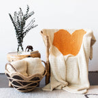 Hand-knitted Merino Wool Heart Throw Blanket, angled view - House Of Avana