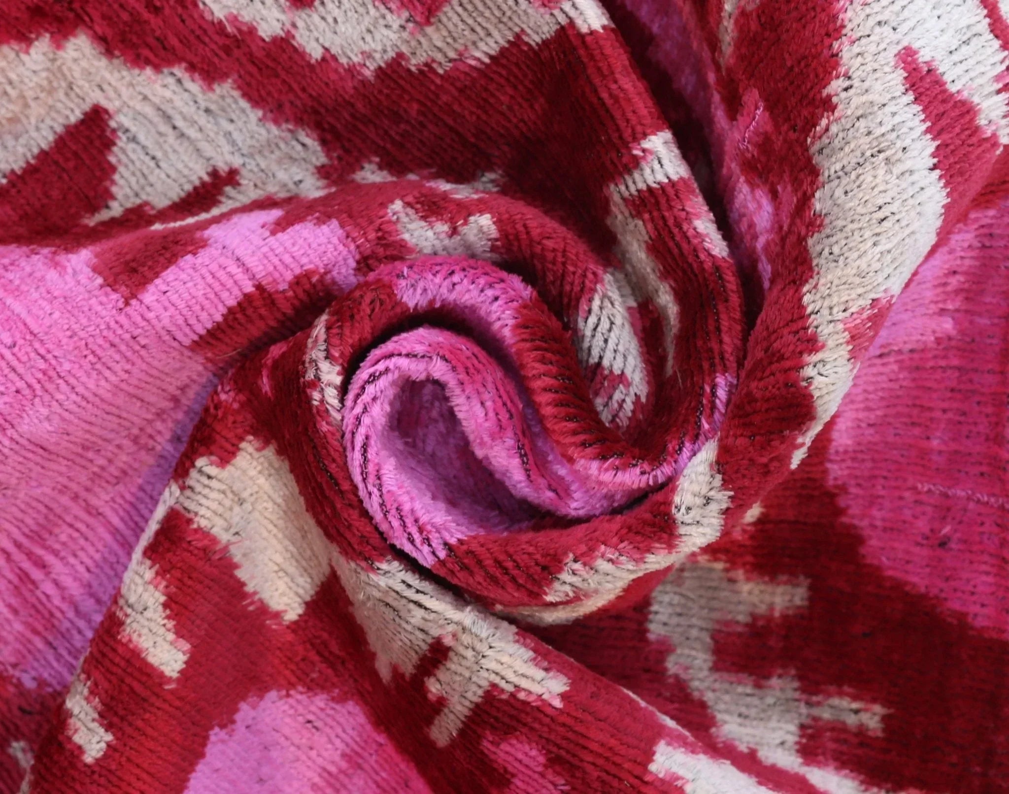 Handmade Velvet Lumbar Pillow in Red and Pink Ikat Floral Design - High-Quality 16x24 Inch Decorative Accent with Premium Down Feather Insert Canvello