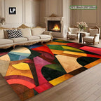 Elegant living room with colorful abstract area rug, fireplace and luxury furniture - House of Avana living room collection