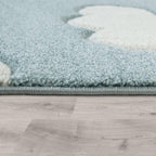 Kids Room Rug Cosmo with Clouds in Pastel Blue White, back view - House Of Avana