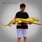 Golden leopard running panther sculpture with detailed spotted pattern and sleek dynamic pose for modern decor