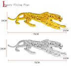 Luxury geometric running panther sculpture in gold and silver with textured gemstone patterns for modern decor
