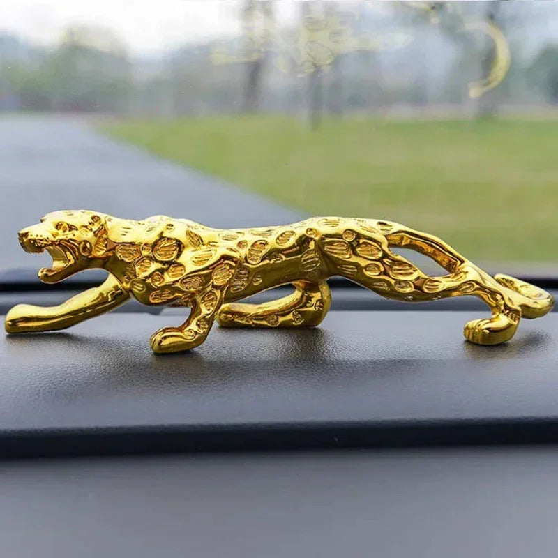 Golden luxury running leopard figurine with metallic finish and detailed spotted pattern for home and office decor
