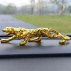 Golden luxury running leopard figurine with metallic finish and detailed spotted pattern for home and office decor