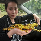 Luxury running leopard figurine with detailed spotted pattern and polished gold finish for car dashboard decor