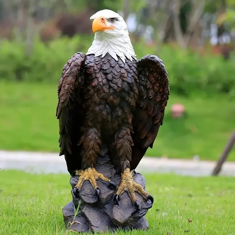 24.5 inch lifelike bald eagle garden statue perched on a rock for outdoor porch and patio decor.
