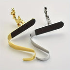 4pcs holiday Christmas stocking holder set, polished Golden and Silvery metal hooks with anti-slip pads, stylish wall-mounted fireplace rack for displaying clothes hangers, suitable for mantel metal fireplace stocking holders House Of Avana