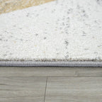 Grey and white area rug with yellow accents, abstract design - House of Avana