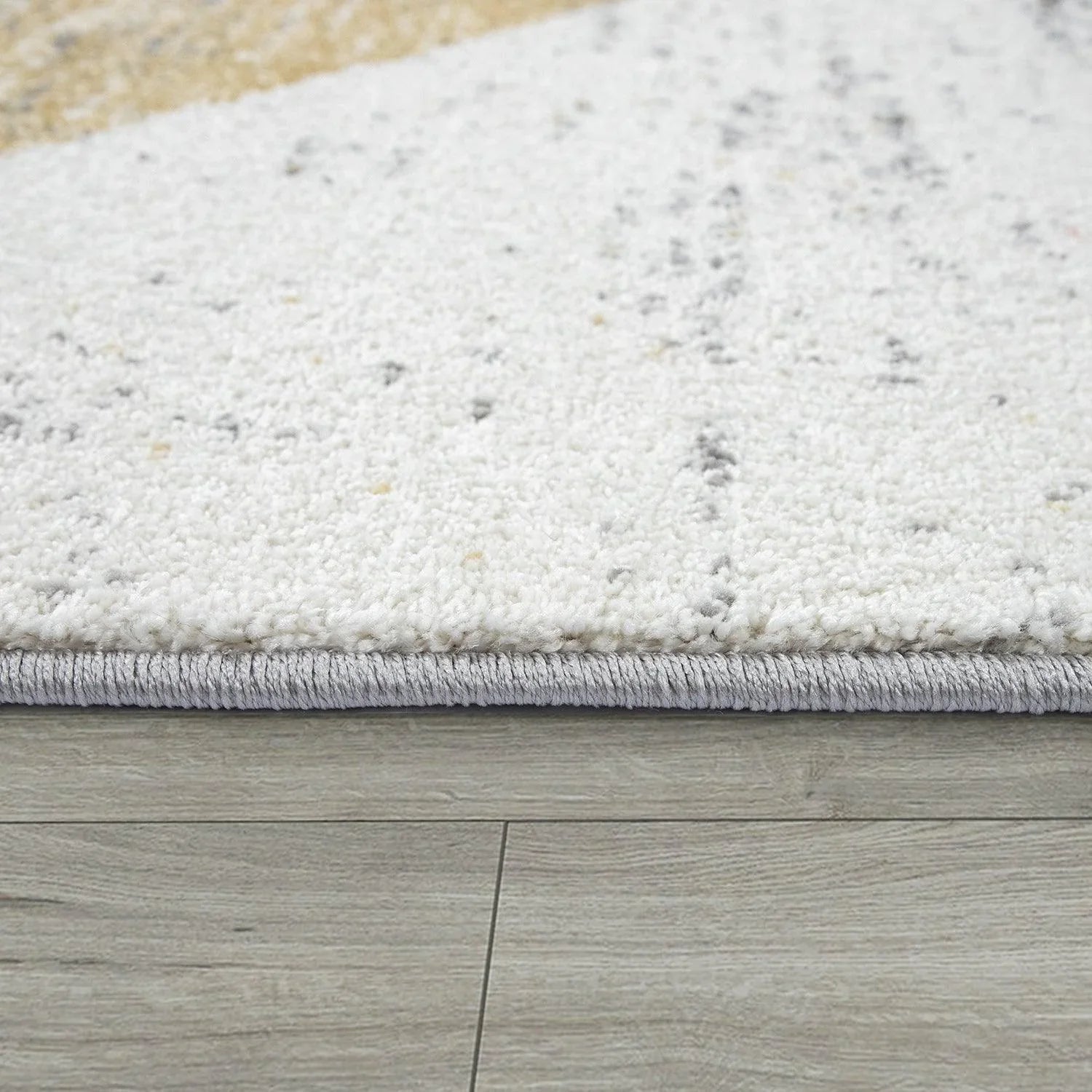 Grey and white area rug with yellow accents, abstract design - House of Avana