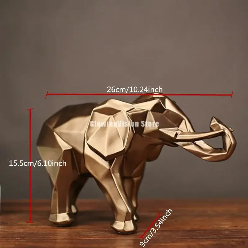 Modern geometric elephant sculpture in metallic gold with faceted angular design for luxury home and office decor