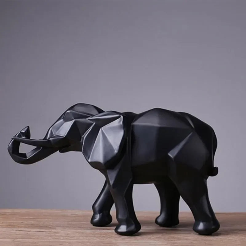 Black modern geometric elephant sculpture with faceted angular design for luxury home and office decor