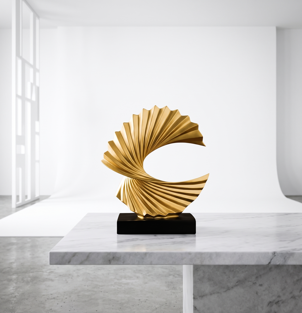 Gold wave sculpture styled on black coffee table | modern living room decor | House of Avana