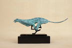 Modern running leopard turquoise patinated bronze sculpture in mid-stride on dark base for living rooms tabletop decor