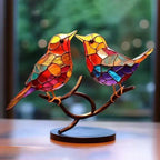 Multicolor stained acrylic birds with intricate mosaic patterns in a comfortable color combination on a bronze branch display