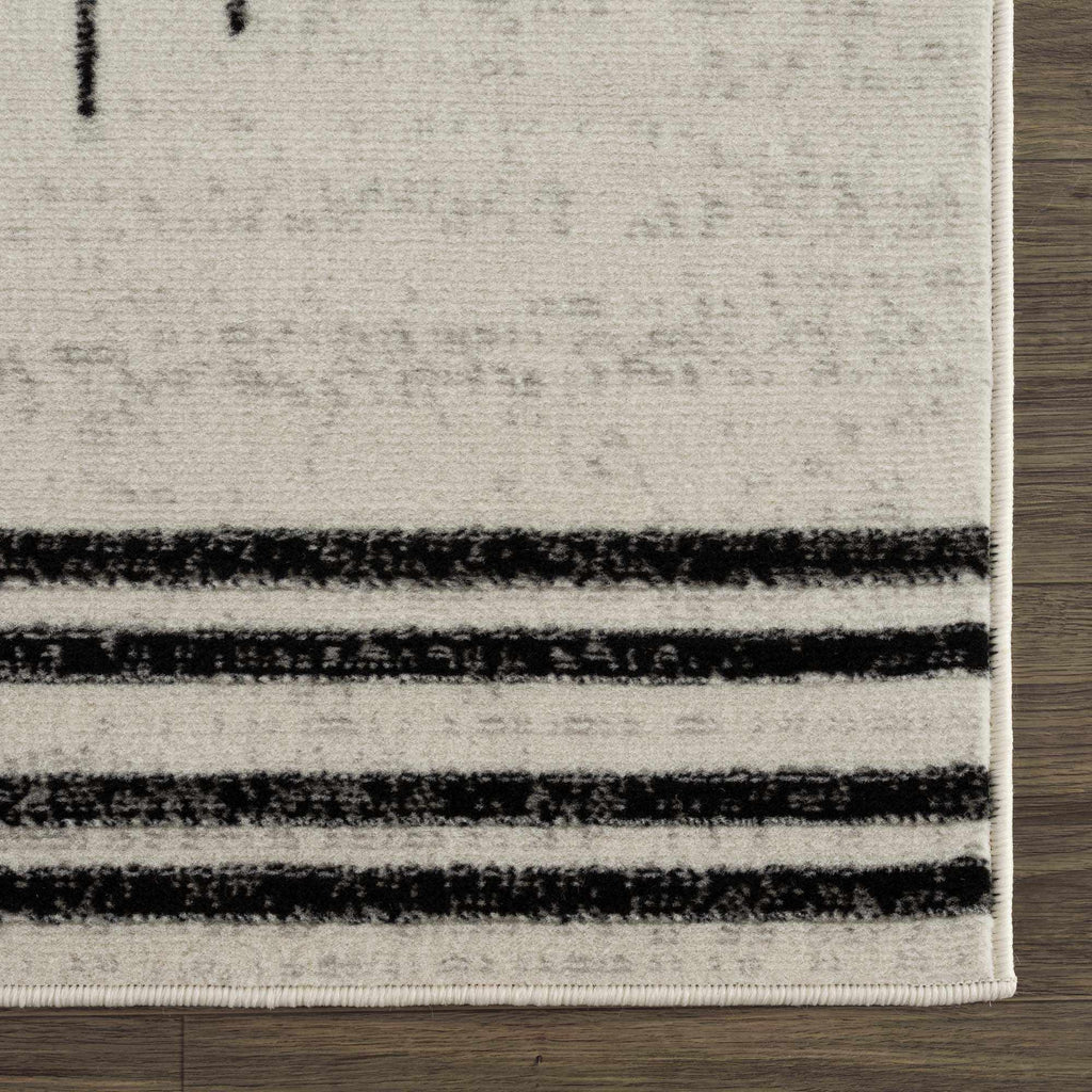 Angus Abstract Black and White Area Rug Hauteloom