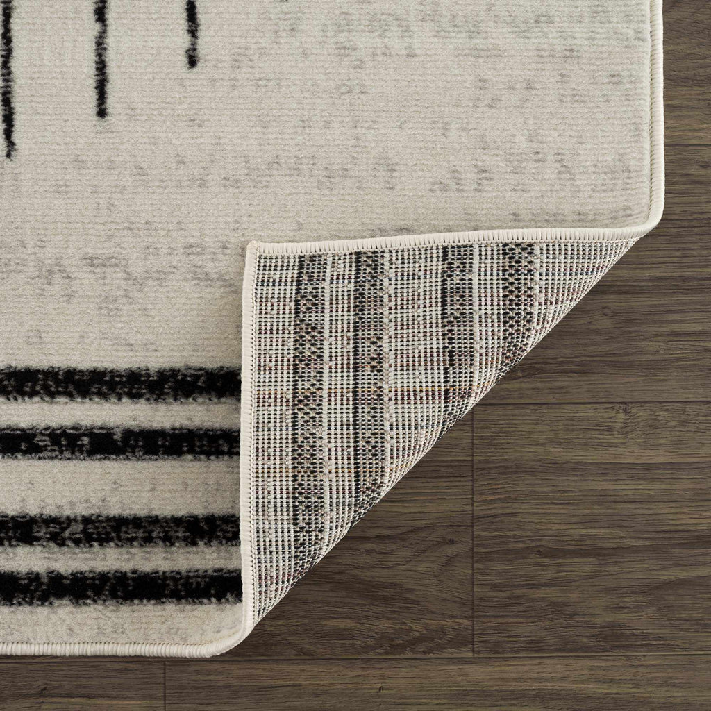 Angus Abstract Black and White Area Rug Hauteloom