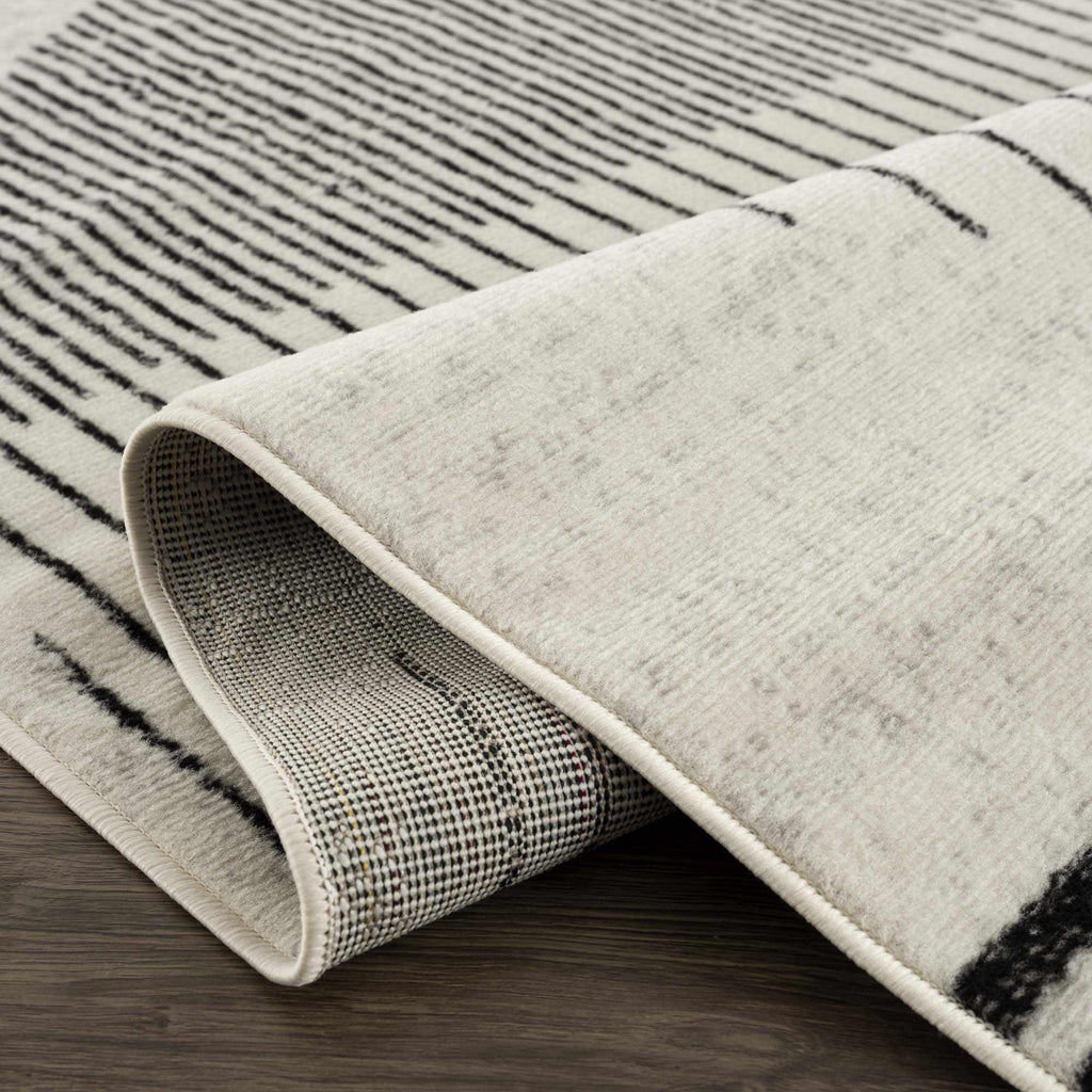 Angus Abstract Black and White Area Rug Hauteloom