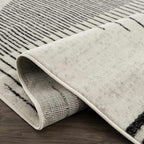 Angus Abstract Black and White Area Rug Hauteloom