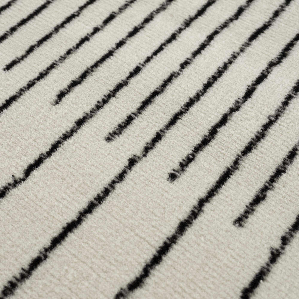 Angus Abstract Black and White Area Rug Hauteloom