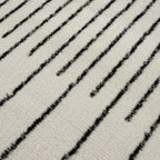 Angus Abstract Black and White Area Rug Hauteloom