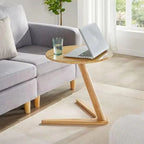 Round wooden side table with compact c-shape design and light wood finish ideal as a living room coffee table