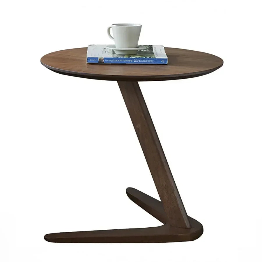 Dark brown round wooden side table with compact z-shaped base ideal as a living room coffee table