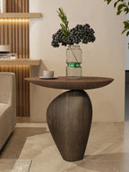Side table cobblestone wooden small with sleek dark wood, compact size, smooth rounded top, and minimalist modern base for living room
