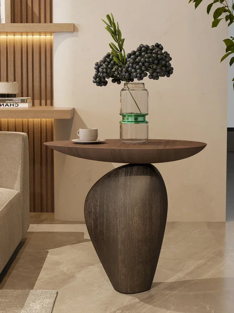 Side table cobblestone wooden small with sleek dark wood, compact size, smooth rounded top, and minimalist modern base for living room