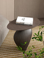 Dark brown cobblestone wooden small side table with sleek curved design and smooth wood grain finish for minimalist modern living room compact size