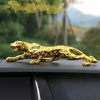 Silver leopard decorative tabletop sculpture featuring a detailed spotted pattern in a sleek dynamic pose for decor