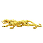 Silver leopard decorative tabletop sculpture featuring a golden jaguar emblem with detailed spotted pattern and sleek finish