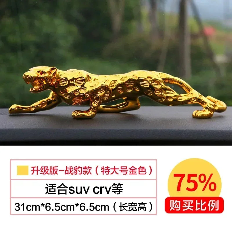Golden metallic jaguar figurine with a sleek glossy finish as a silver leopard decorative tabletop sculpture
