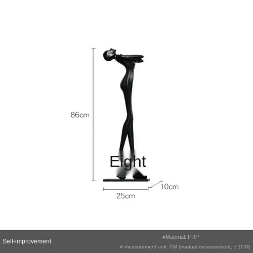 Black frp figurine with elongated limbs on rectangular base for modern home decor in living room or sofa cushion setting