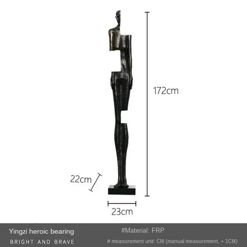 Black abstract figurine sculpture made of frp with angular design standing near sofa cushion for living room decor