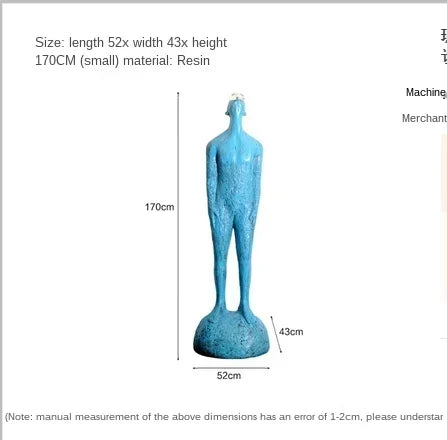 A tall slender blue resin sculpture with textured skin complements sofa cushion home decor in living room settings
