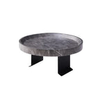 Sofa tray table featuring a circular dark gray marble tray with sleek black metal legs for small spaces