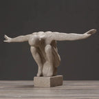 Gray stone thinker statue in dynamic crouching pose made of nordic resin for modern nordic decor and home decor