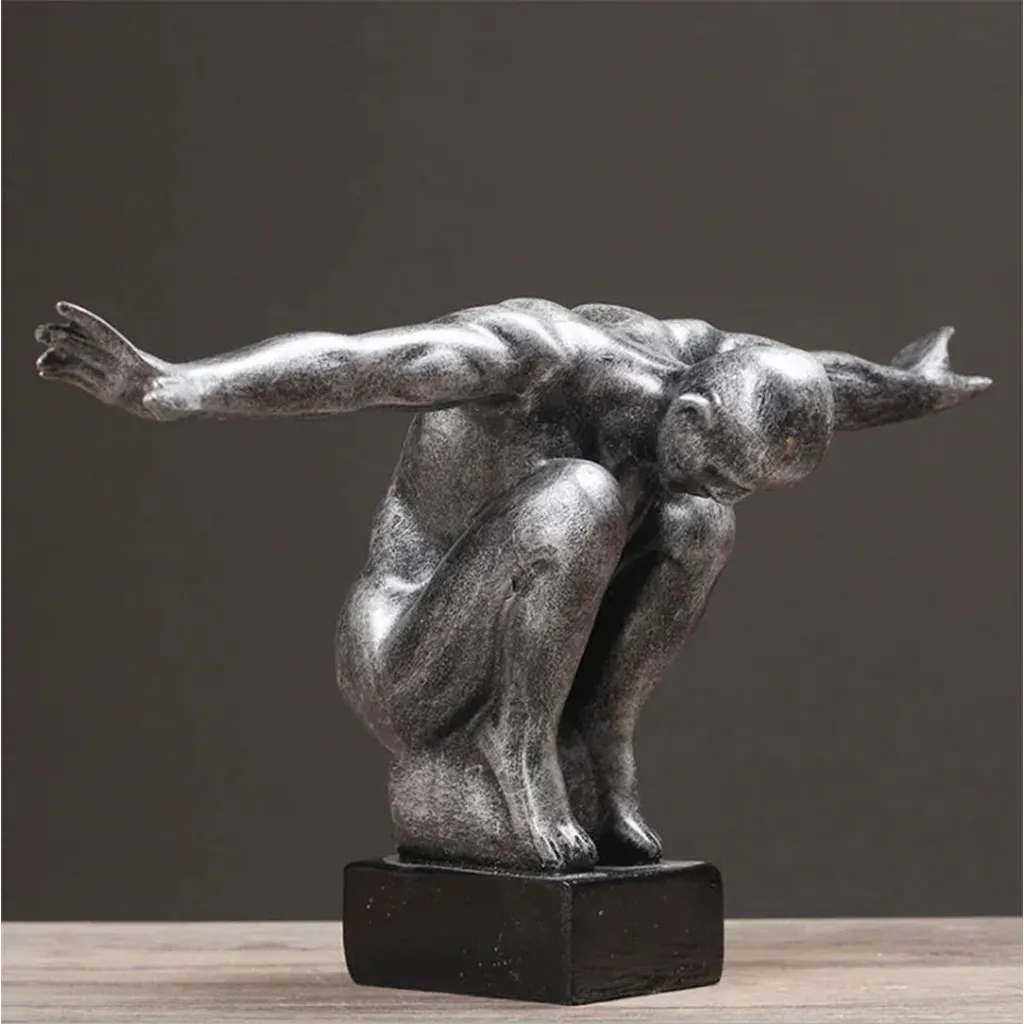 Silver-toned metallic thinker statue resin art sculpture with arms outstretched on black base for modern nordic decor
