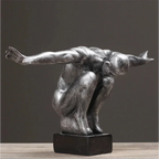 Silver-toned metallic thinker statue resin art sculpture with arms outstretched on black base for modern nordic decor