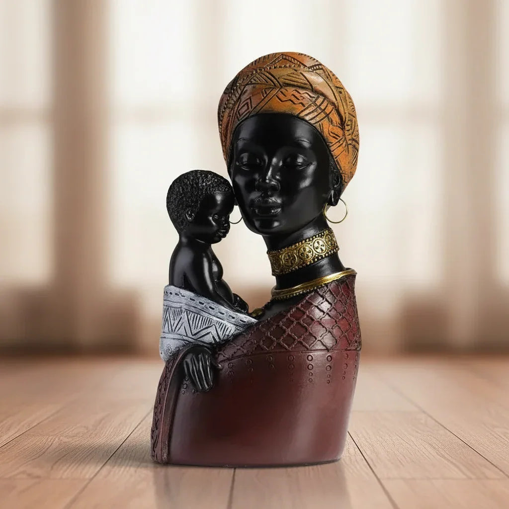 Traditional african mother and child resin sculpture with black and brown finish and intricate gold detailing