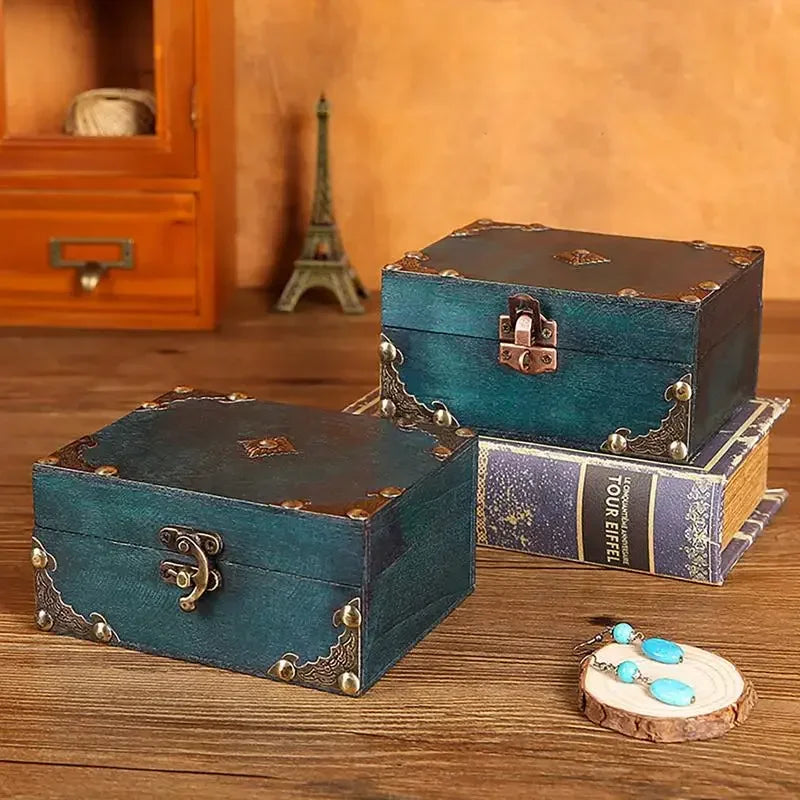 Teal wooden treasure box with brass hardware and decorative corners compact size for home decor use
