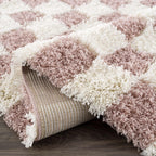 Atira Pink Checkered Area Rug Hauteloom