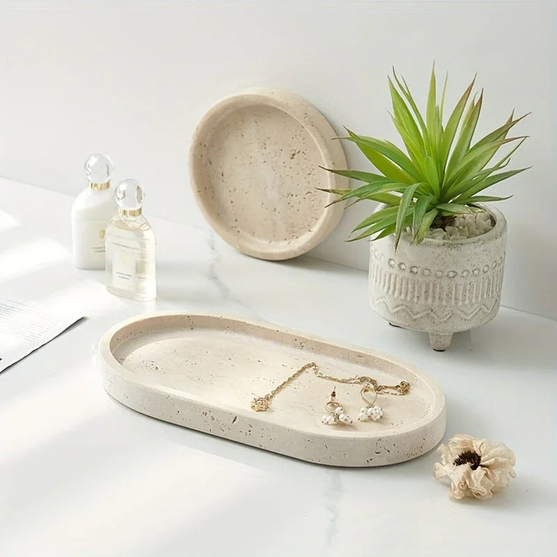 One Piece of Natural Travertine Stone Vanity Tray Designed for Bathroom Use, Perfect for Organizing Perfumes And Cosmetics. This Round Decorative Tray in Beige Is Also Suitable for Kitchen Organization And Home Decor. House Of Avana [[SKU:HOA-TRK-001]]