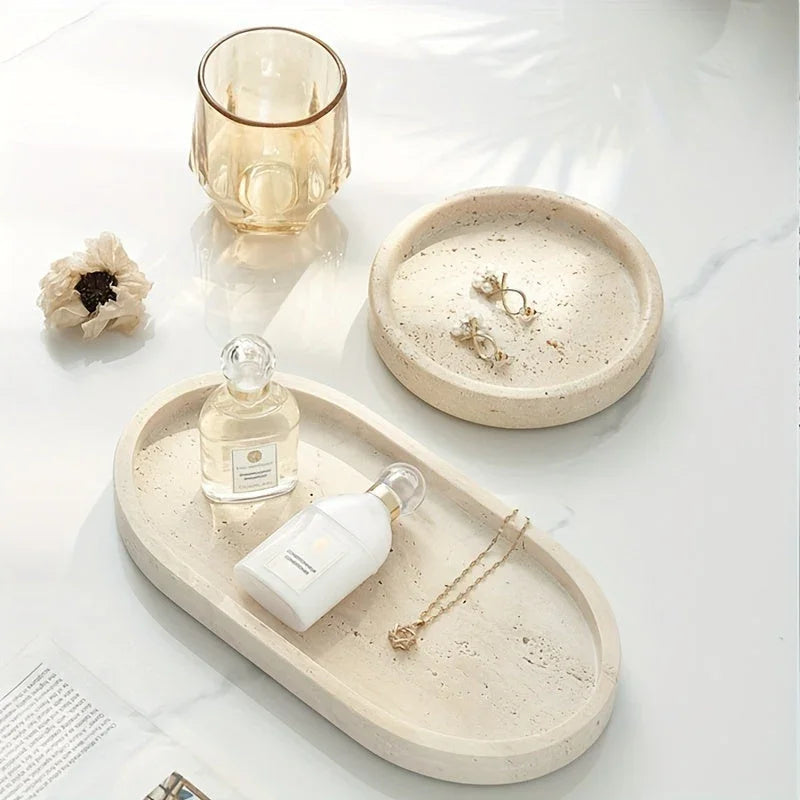 One Piece of Natural Travertine Stone Vanity Tray Designed for Bathroom Use, Perfect for Organizing Perfumes And Cosmetics. This Round Decorative Tray in Beige Is Also Suitable for Kitchen Organization And Home Decor. House Of Avana [[SKU:HOA-TRK-001]]