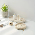 One Piece of Natural Travertine Stone Vanity Tray Designed for Bathroom Use, Perfect for Organizing Perfumes And Cosmetics. This Round Decorative Tray in Beige Is Also Suitable for Kitchen Organization And Home Decor. House Of Avana [[SKU:HOA-TRK-001]]