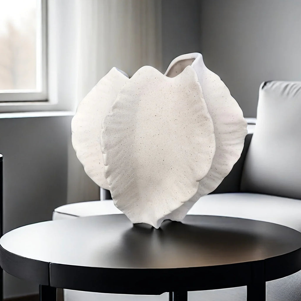 Beige Ceramic Vase with Textured Art Design and Smooth Interior, close-up view - House Of Avana